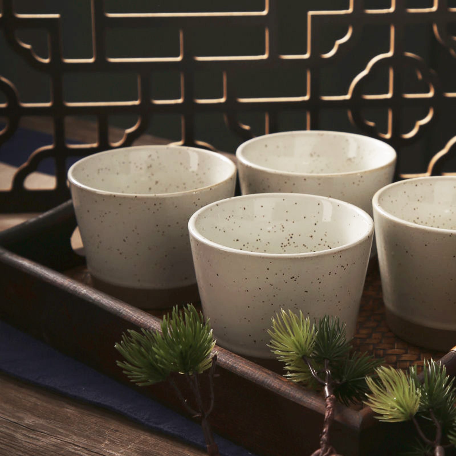 Elegant Beige Tea Cups with a Touch of Natural Brown