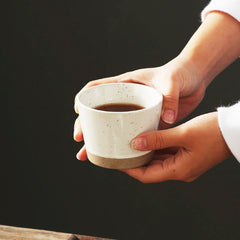 Elegant Beige Tea Cups with a Touch of Natural Brown