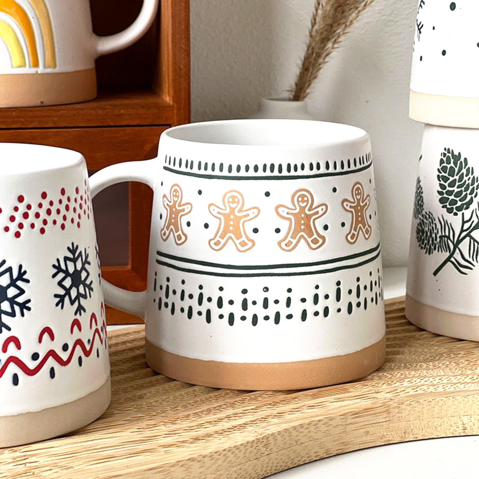 Nordic Christmas Mugs with Gingerbread and Pinecone Patterns