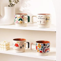 Stackable Elegance: Coffee Mugs with Artistry and Adventure