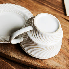 Elegant White and Cream Swirl-Pattern Coffee Cup with Matching Saucer
