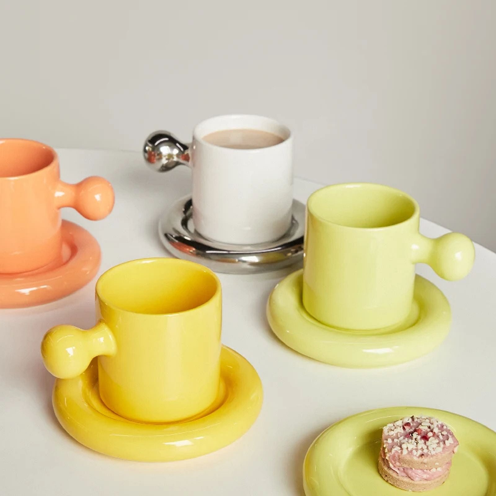 Playful Ceramic Mugs with Eye-Catching Handles-15