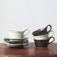 Sophisticated Ceramic Coffee Cups with Unique Glaze Designs and Matching Saucers-1