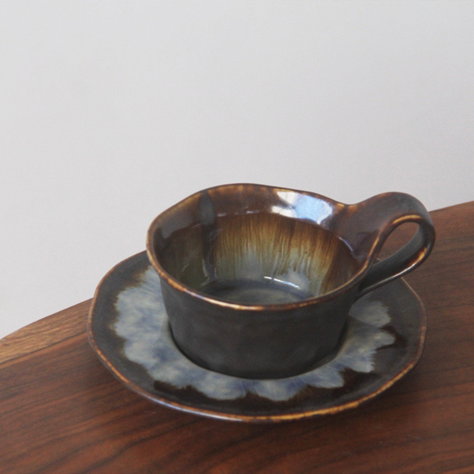 Sophisticated Ceramic Coffee Cups with Unique Glaze Designs and Matching Saucers-4