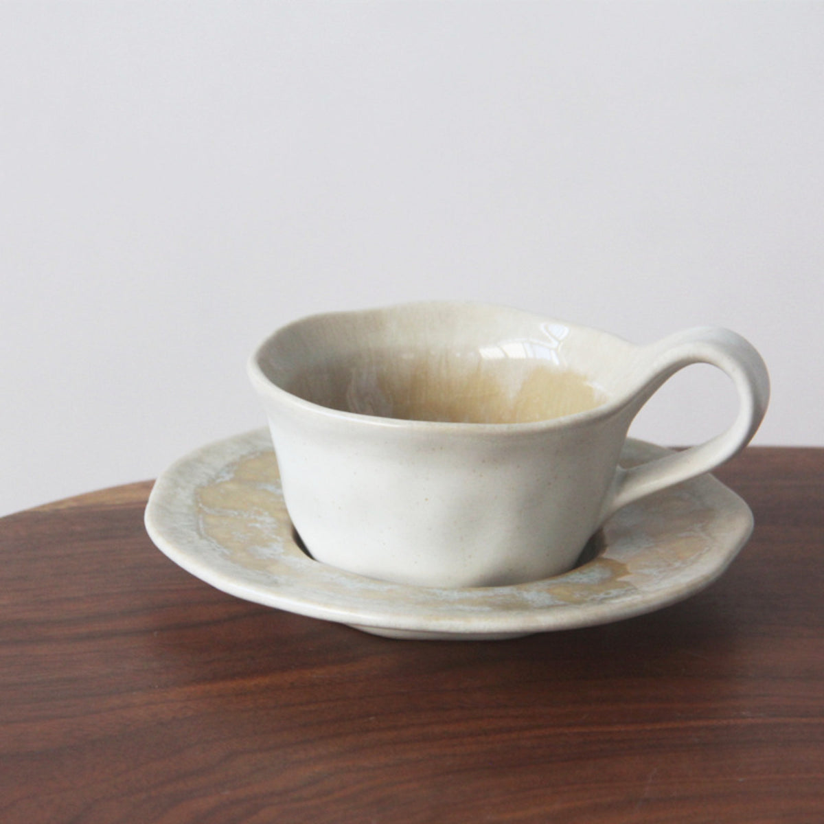 Sophisticated Ceramic Coffee Cups with Unique Glaze Designs and Matching Saucers-0