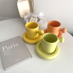 Playful Ceramic Mugs with Eye-Catching Handles-23